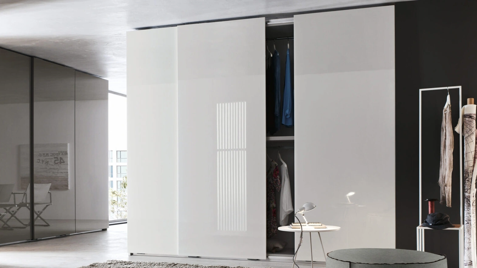 Sliding Wardrobe Wall with glossy lacquer finish by Maronese