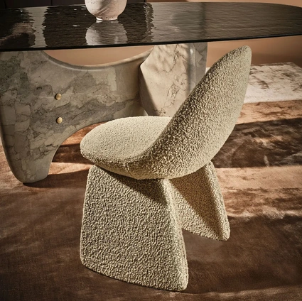 Pluma Chair upholstered in Nature Design fabric