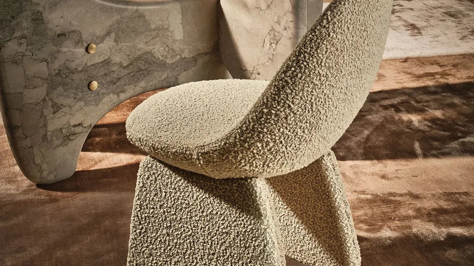 Pluma Chair upholstered in Nature Design fabric