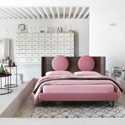 Hugh One bed with headboard in Walnut by Noctis.