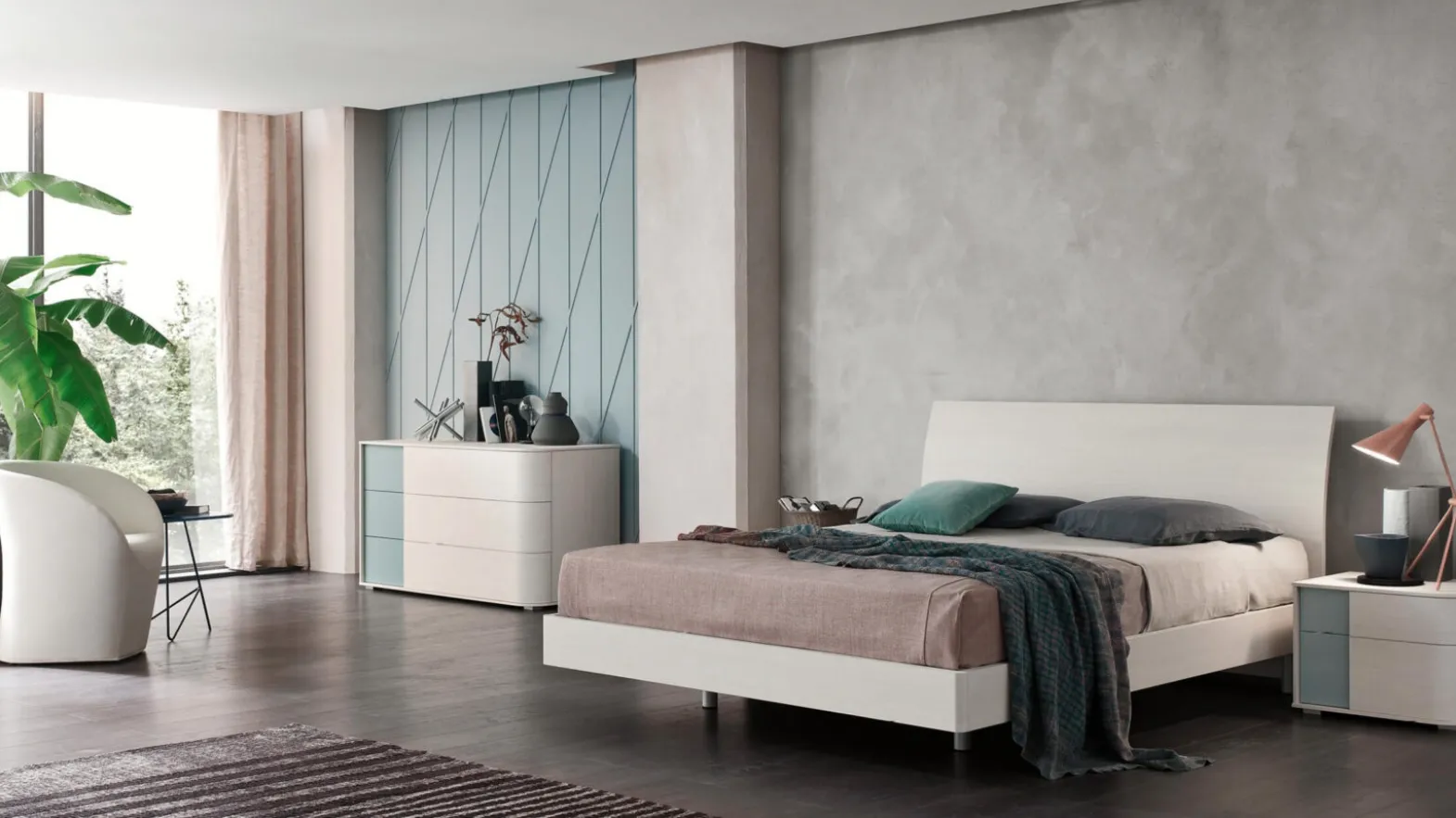 Bed with Vela headboard by Maronese.