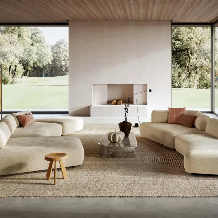 Capriccio fabric living room with peninsula and linear sofa by Le Comfort.