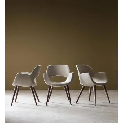 Logan upholstered chair in fabric by Maronese.