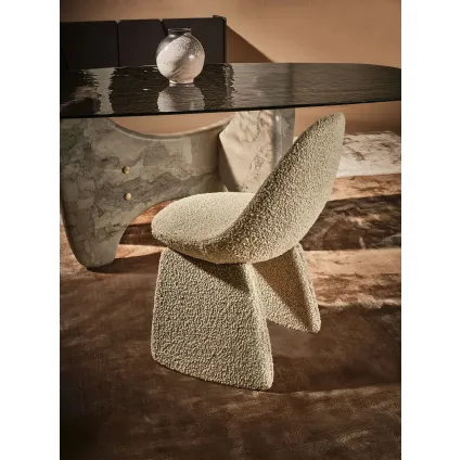 Pluma Chair upholstered in Nature Design fabric