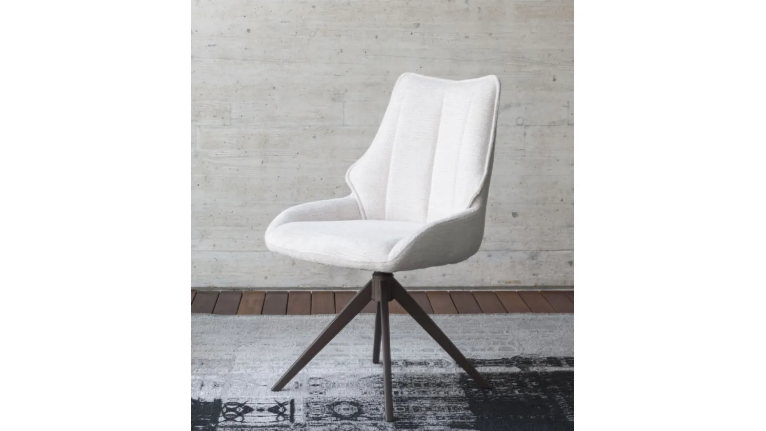 Raya chair in padded fabric by Altacom.