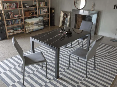 Performance Ceramic extendable table in glossy ceramic glass with black painted metal base by La Seggiola