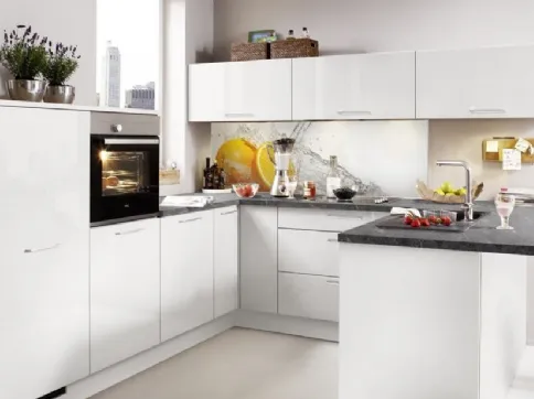 Modern kitchen with Lux glossy white peninsula by Nolte