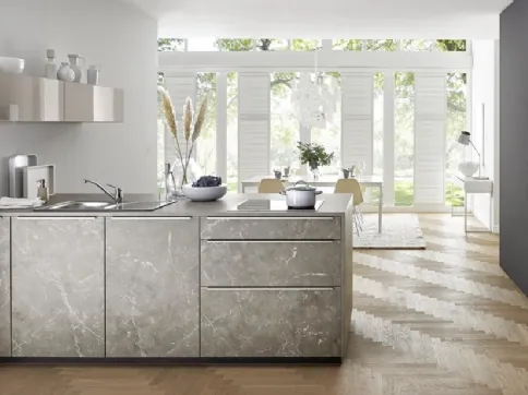 Modern kitchen with Manhattan peninsula with Nolte marble effect
